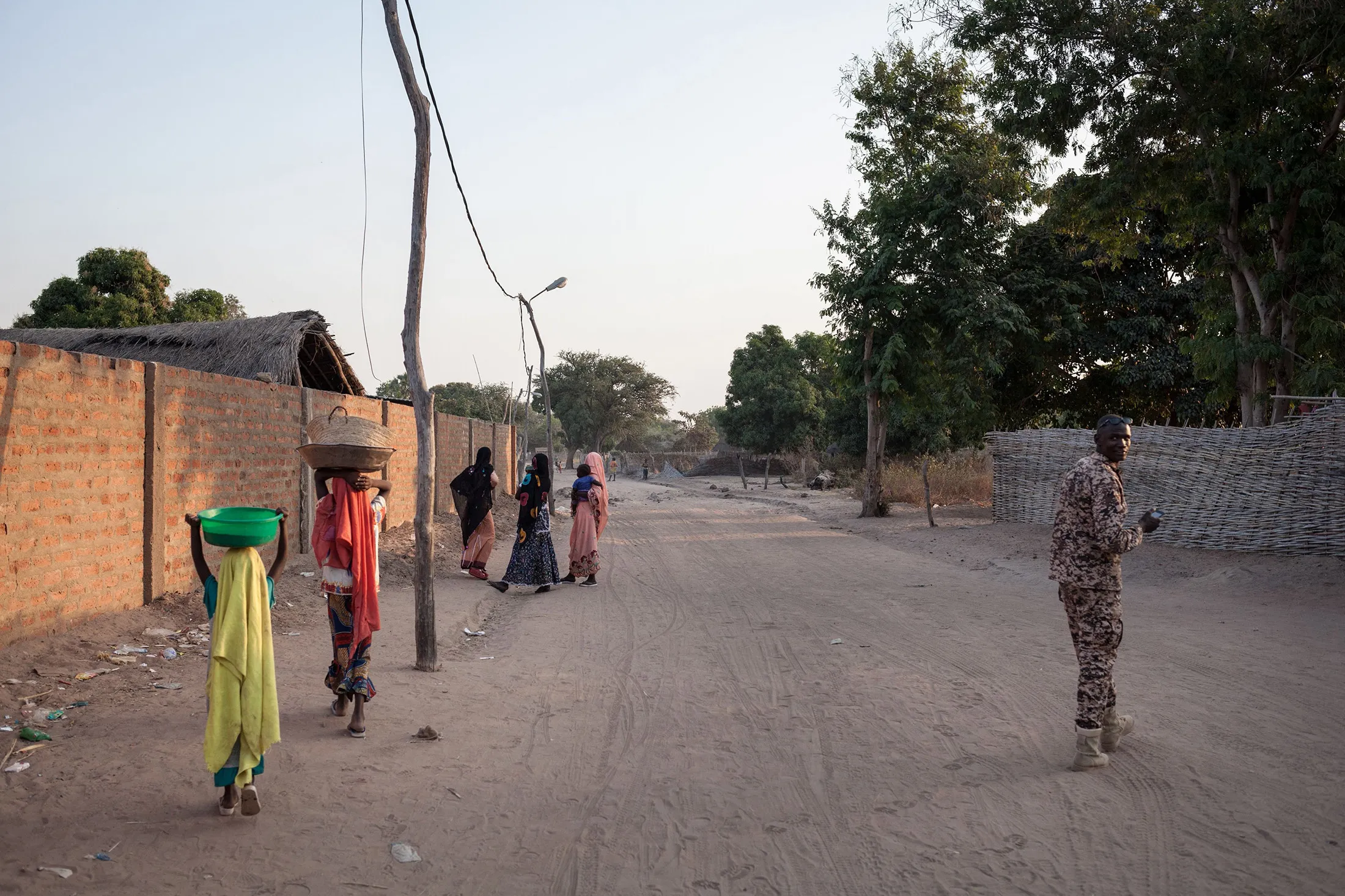 Pedestrians and a&nbsp;FPRC&nbsp;member in&nbsp;Birao, northern Central African Republic, on Dec. 20, 2017.