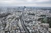 Commercial and residential buildings are seen from the observatory in the Roppongi Hills Mori Tower, operated by Mori Building Co., in Tokyo, Japan, on Thursday, July 30, 2020. Officials in Japan are planning stricter measures on businesses and group activities as coronavirus cases continue to spread from a concentration around the capital to other urban areas across the country.