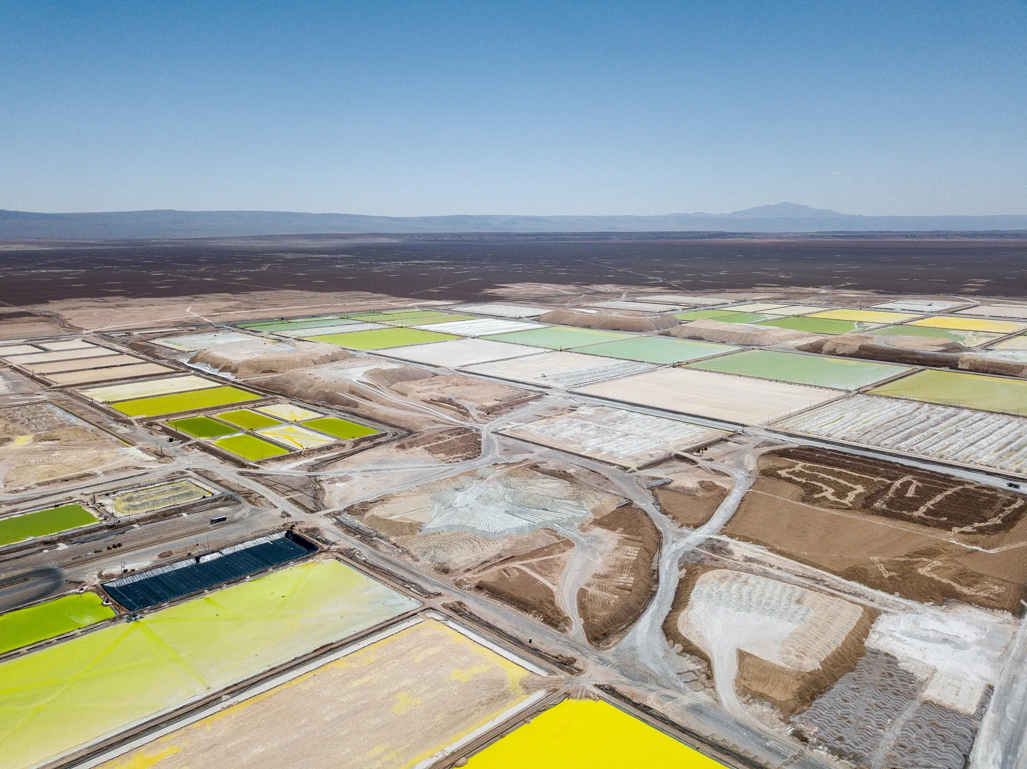 Brine pools at a SQM&nbsp;lithium mine on the Atacama salt flat in the Atacama Desert, Chile.