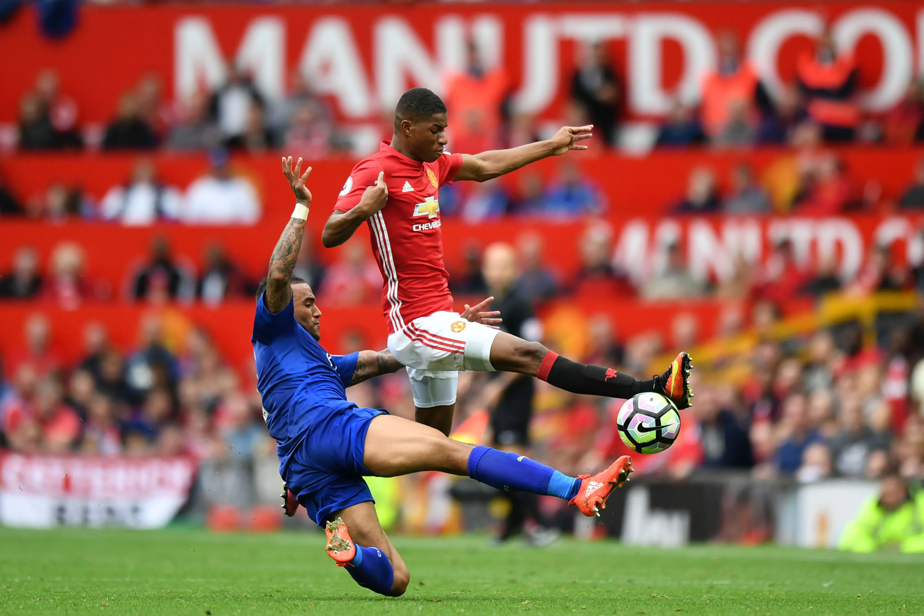 Danny Simpson&nbsp;tackles Manchester United's Marcus Rashford during the English Premier League football match.