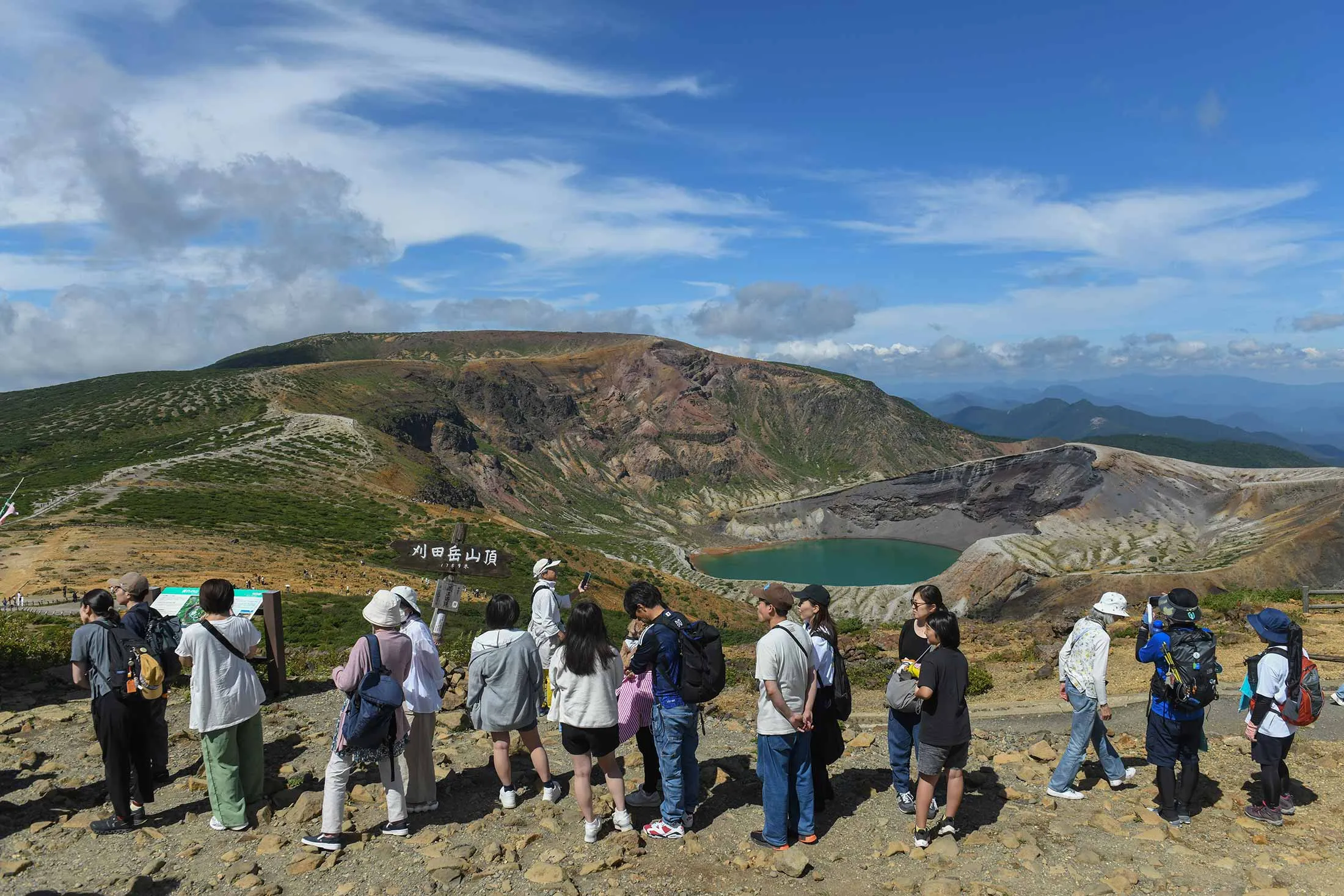 Okama Crater Lake, which sits below the Zao Mountains.