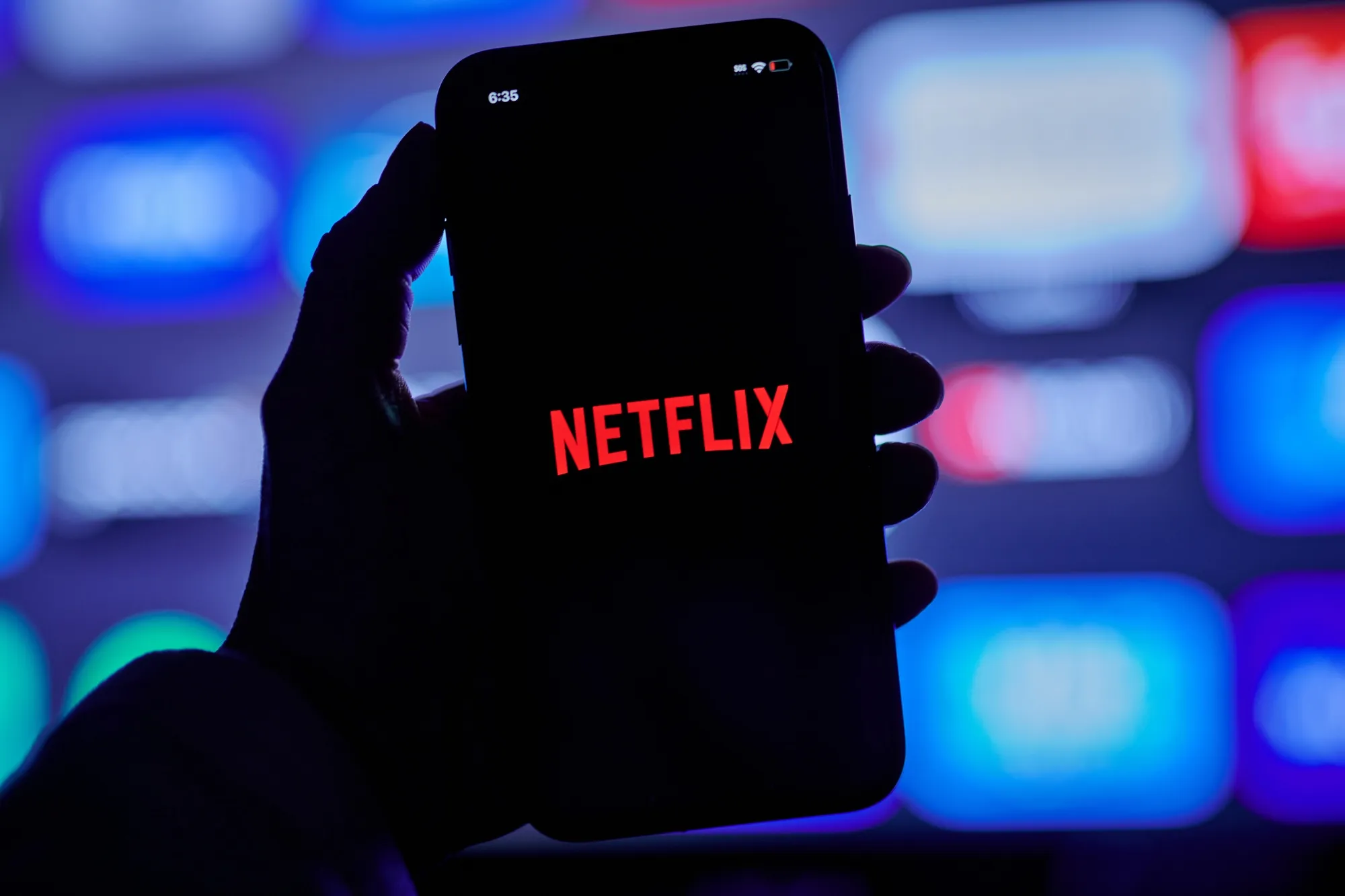 The Netflix logo on a smartphone arranged in the Queens borough of New York, US, on Tuesday, March 26, 2024. Netflix Inc. is scheduled to release earnings figures on April 18.