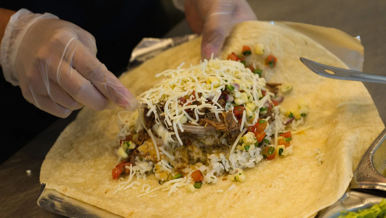A chicken burrito at a Chipotle Mexican Grill.
