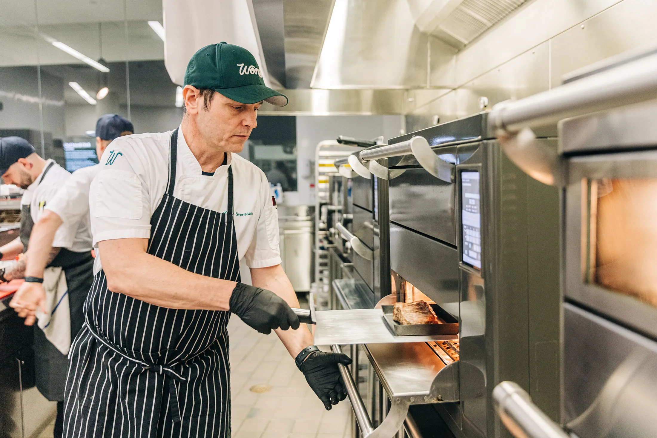 A chef cooking a steak at Wonder’s R&D kitchen in Parsippany, New Jersey.