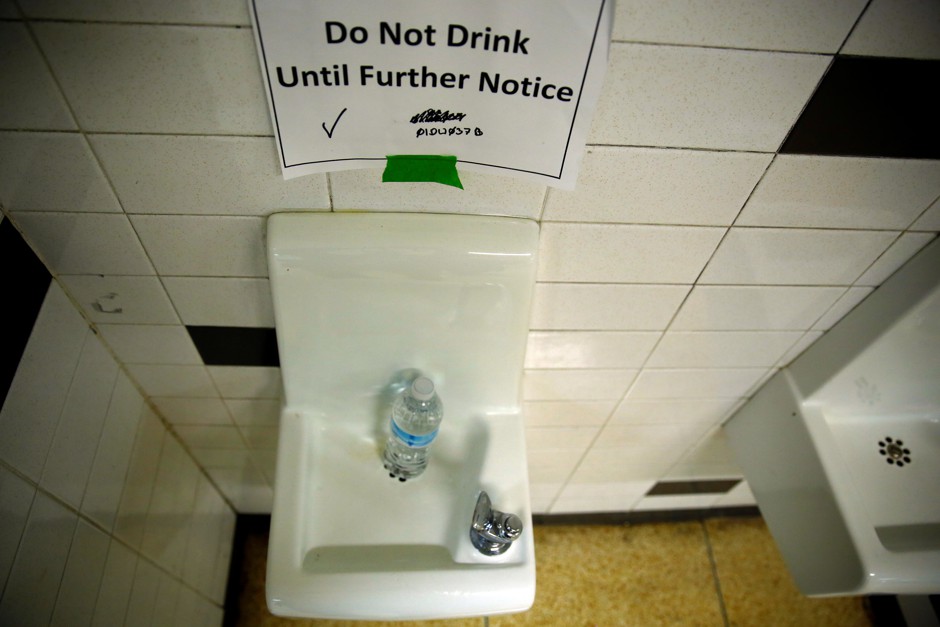 A sign next to a water dispenser at North Western high school in Flint in May 2016.