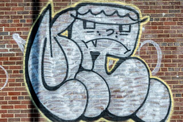 Angry face with crown at 84th Street at Roosevelt Avenue, Queens