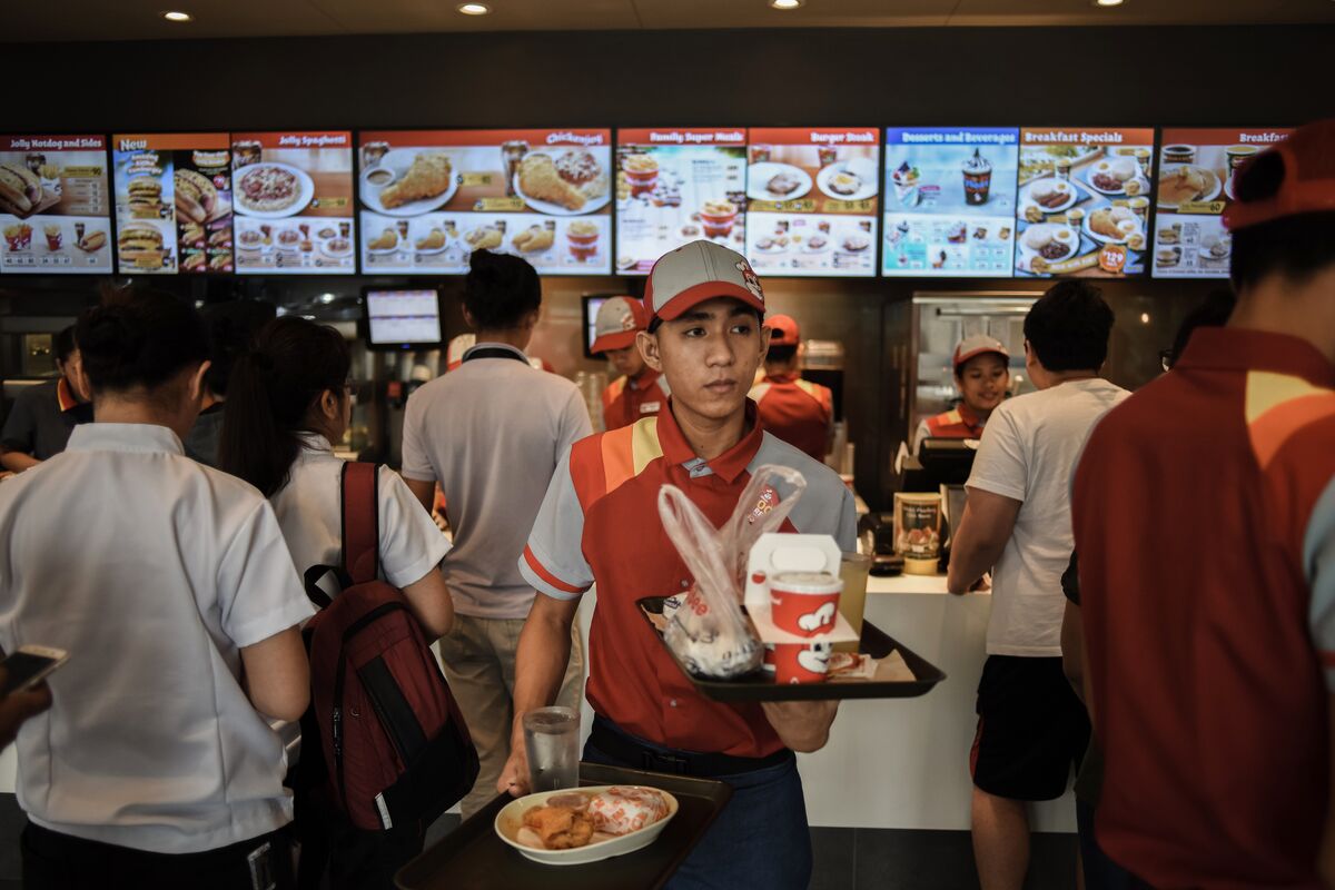 Jollibee’s Overseas Push May Cost Stock’s Premium Valuation - Bloomberg