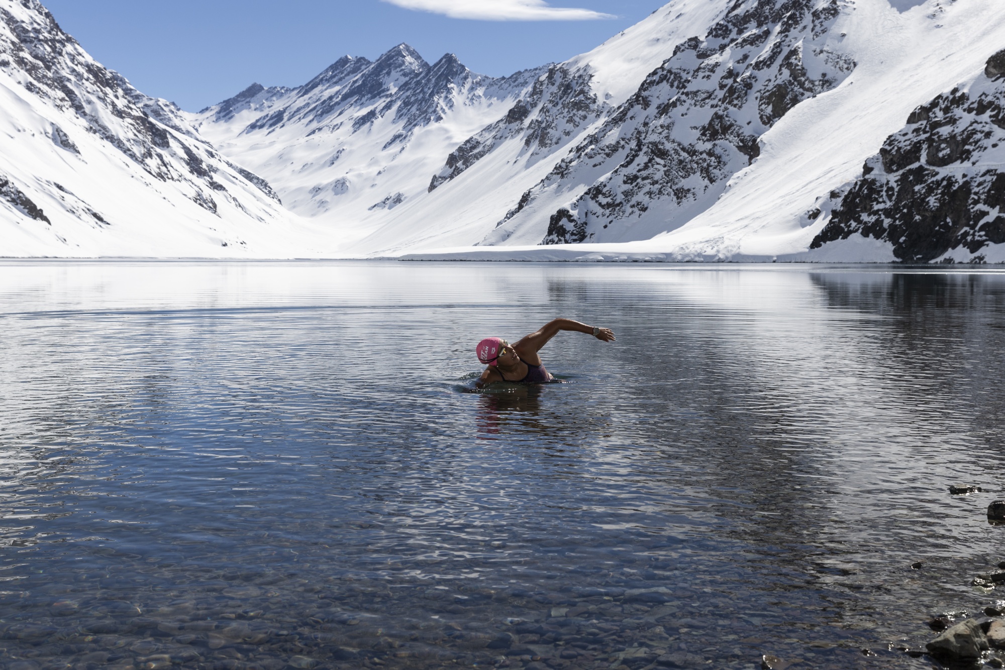 Barbara Hernandez (1985), a Chilean extreme open-water and cold-water swimmer known as the “Ice Mermaid”, swimming in Laguna del Inca, a lake located in Portilllo, a town in the Valpara