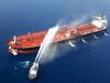 An Iranian navy boat tries to containe the fire on the Front Altair tanker in the Gulf of Oman on June 13.