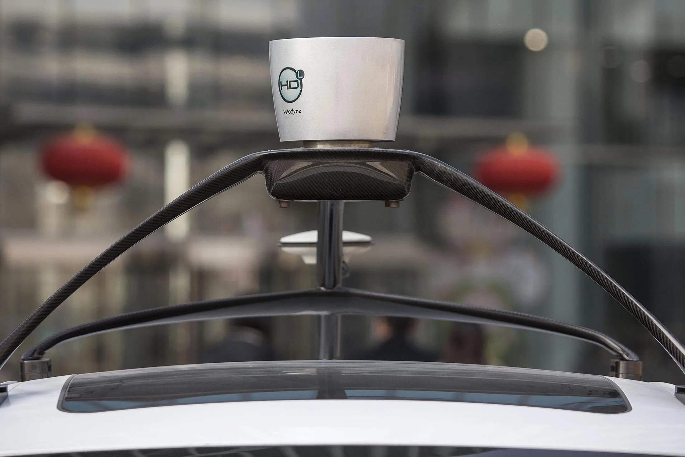 A sensor sits mounted on the roof of the Baidu Inc.'s autonomous car at the company's headquarters in Beijing, China, on Jan. 19, 2016.
