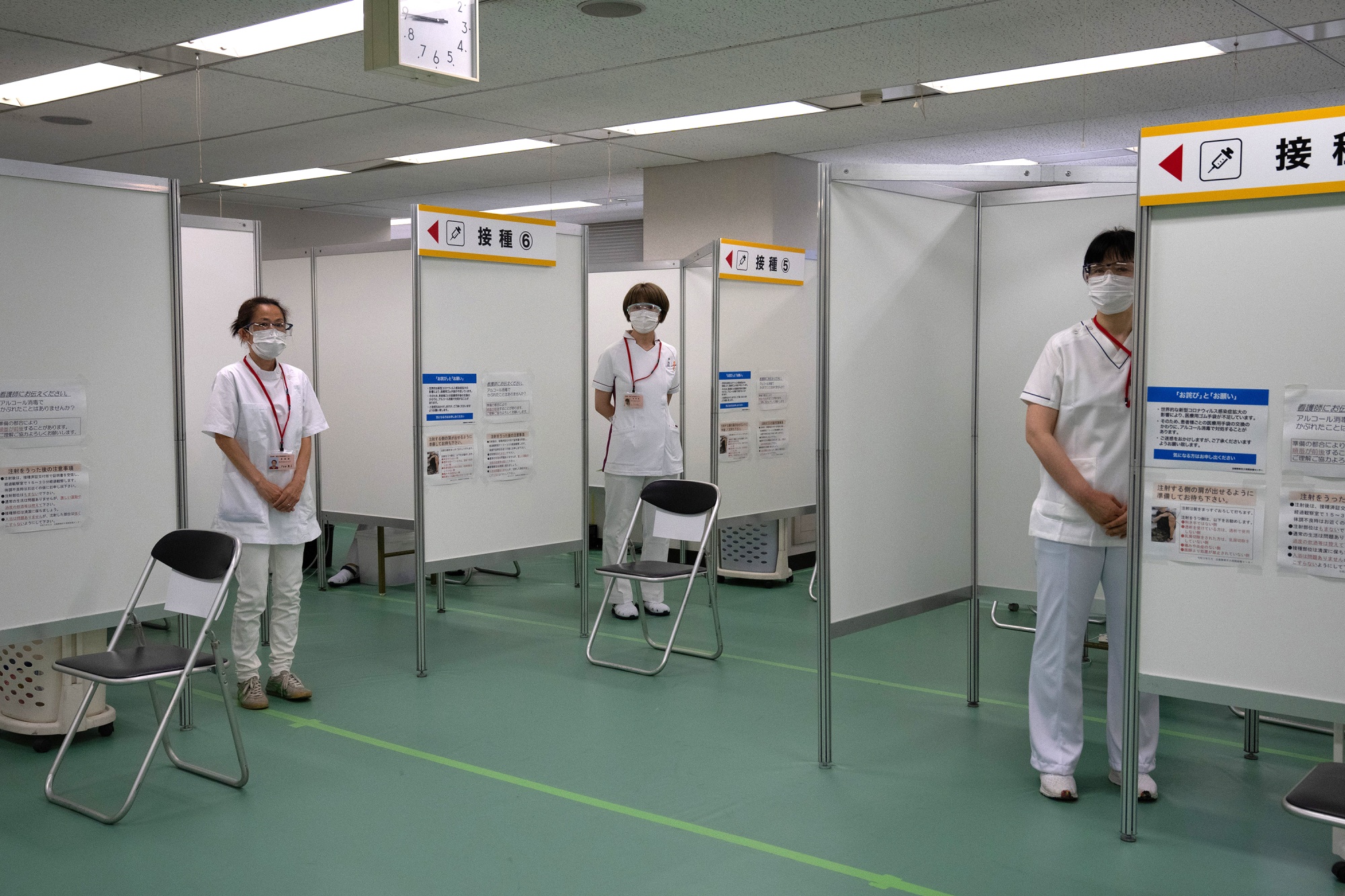 Nurses wait to inoculate people with a dose of the Moderna Inc. Covid-19 vaccine at a newly-opened mass vaccination site in Tokyo, Japan, on May 24.