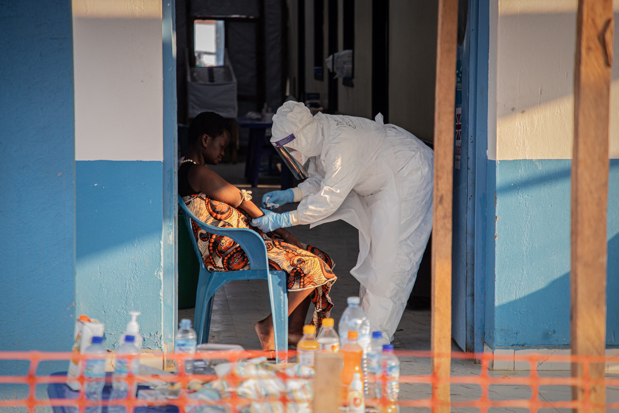A healthcare worker takes samples from a patient suffering from Ebola virus the Ebola Treatment Center in Bunia, Ituri, Democratic Republic of Congo. Photographer: Benediction Murhabazi/AFP/Getty Images