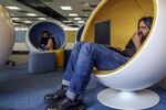 Flipkart employees work at the company's online services headquarters in Bengaluru.