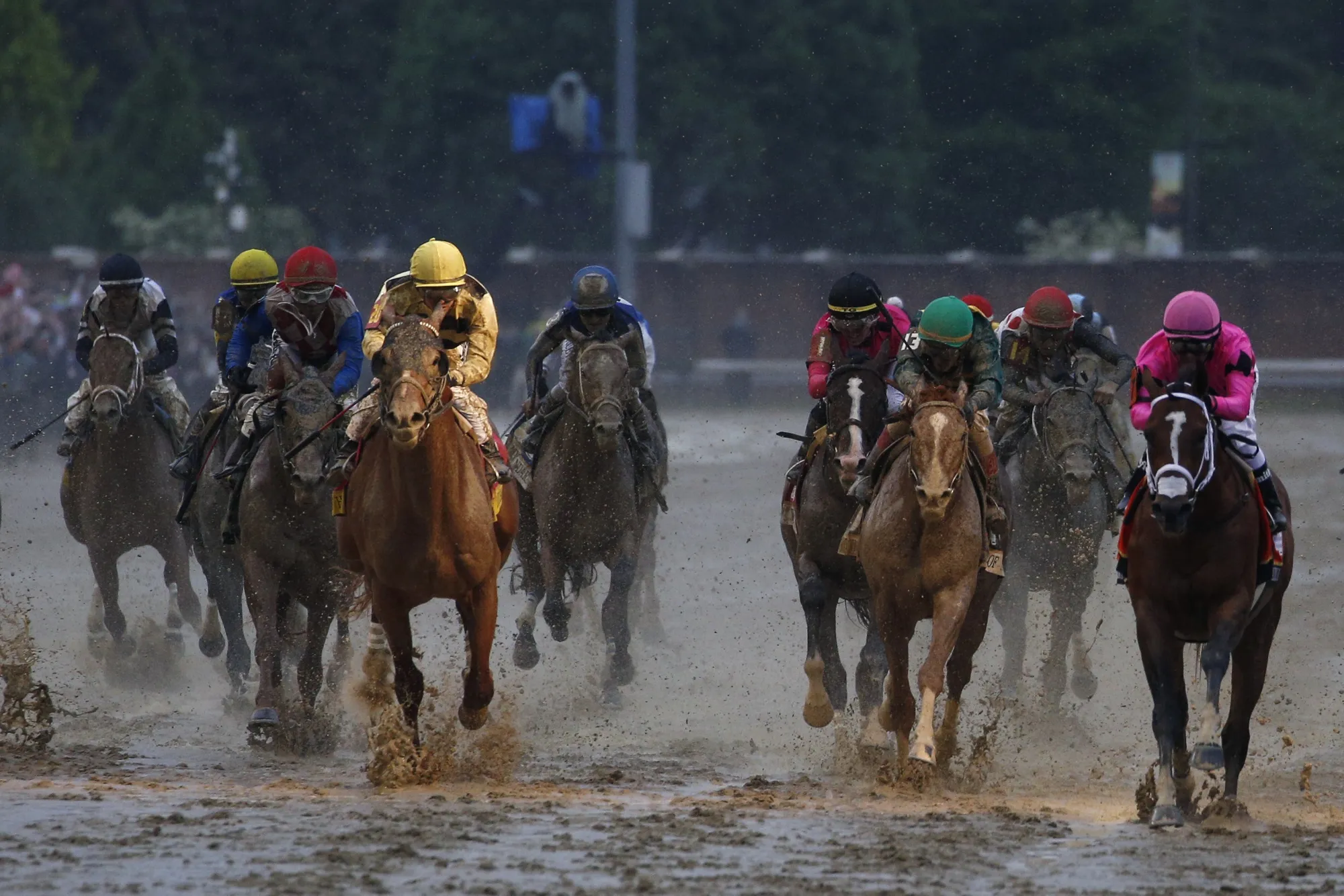 Jockey Flavien Prat, front left, atop Country House crosses the finish line during the Kentucky Derby on May 4.