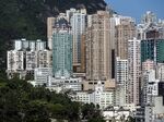 Residential buildings stand in Hong Kong, China.