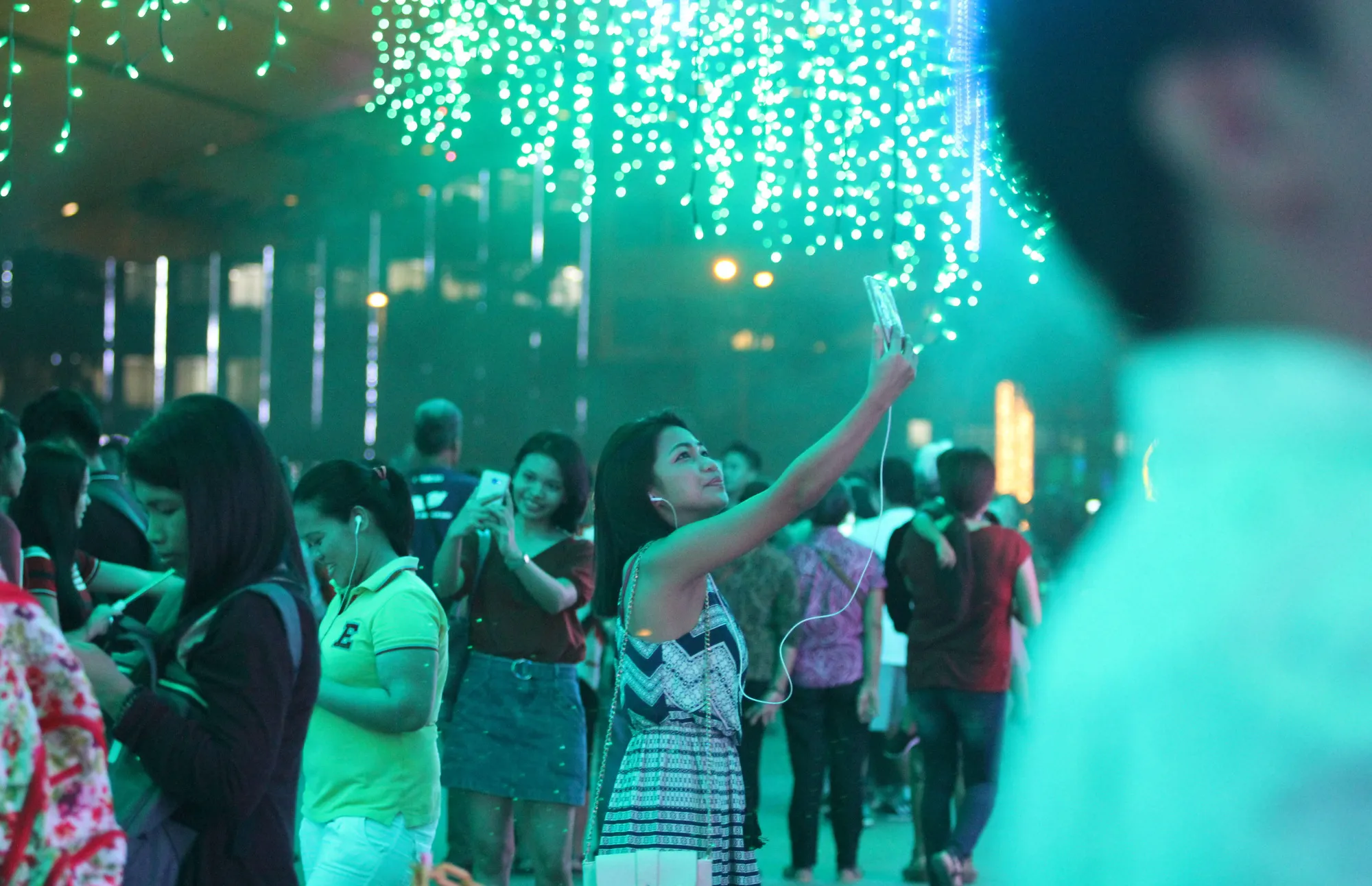 People visit the Festival of Light in Makati, Manila's financial district in 2017.