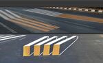 A sideways view (top image) and front-facing view of the 3D zebra crossing (bottom image).