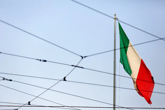 The Italian national flag flies in Turin
