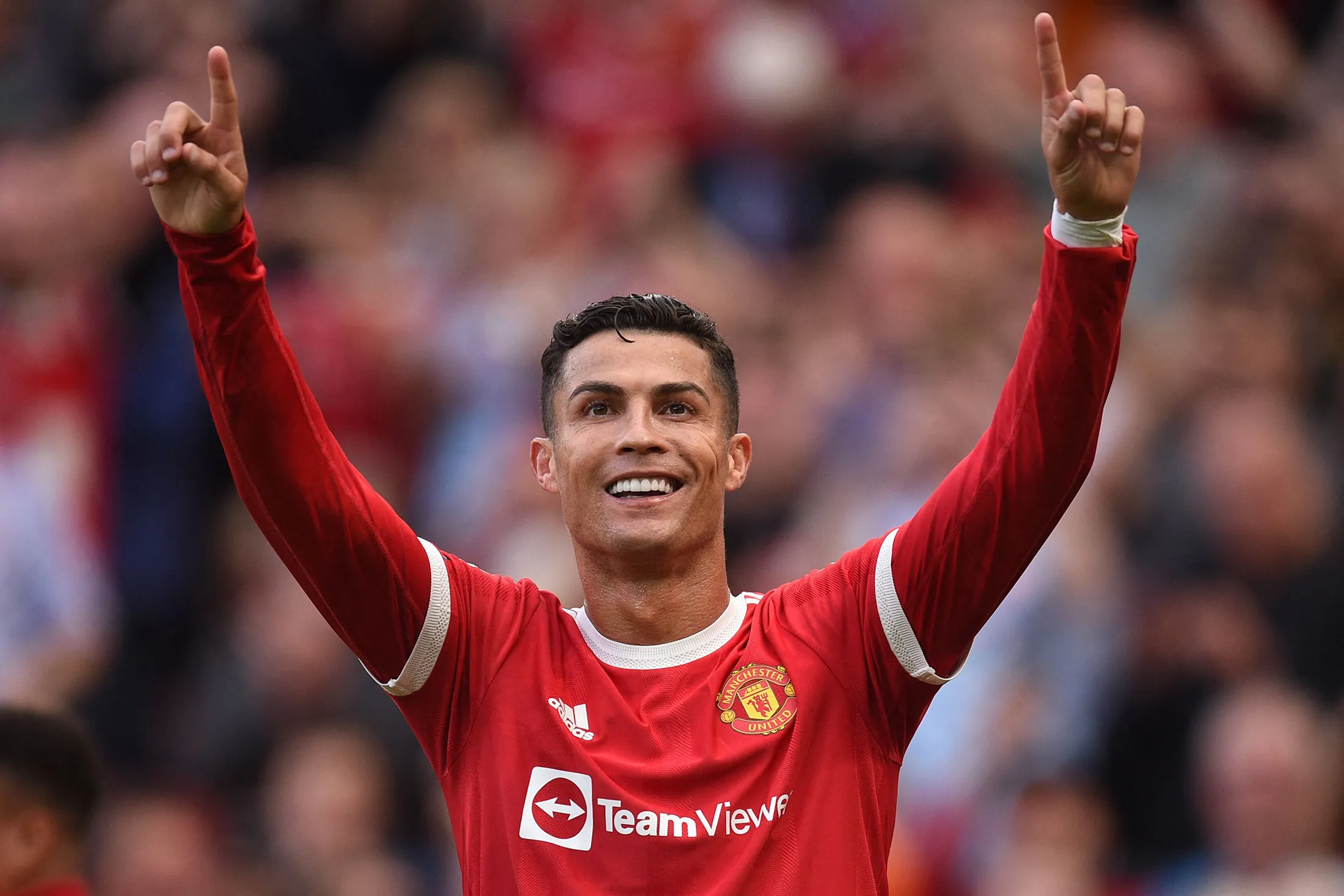 Cristiano Ronaldo celebrates after scoring a second goal during a&nbsp;match between Manchester United and Newcastle at Old Trafford in Manchester on Sept.&nbsp;11.