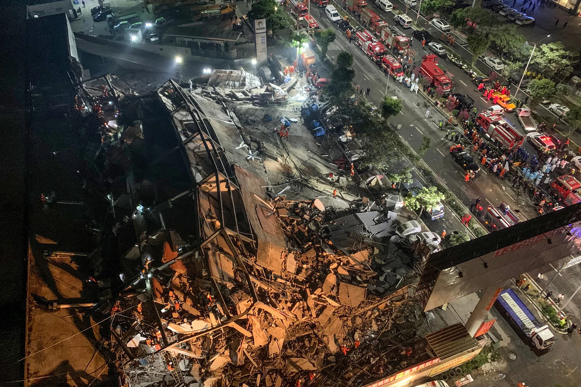 Rescuers search for survivors in the rubble of a collapsed hotel in Quanzhou&nbsp;on March 7.
