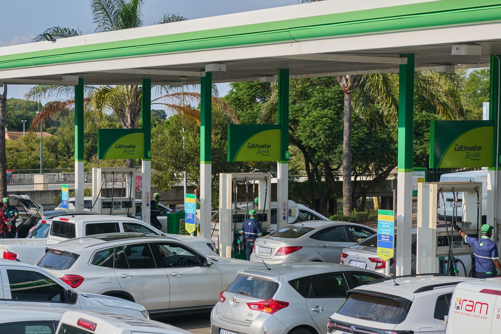 Vehicles line up at a BP Plc gas station in Pretoria, South Africa, on March 31.