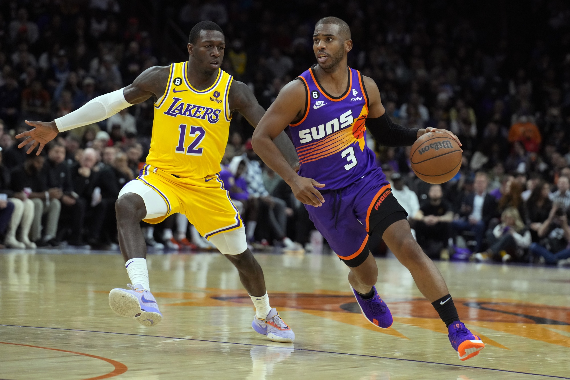 Chris Paul of the Phoenix Suns dribbles the ball against the