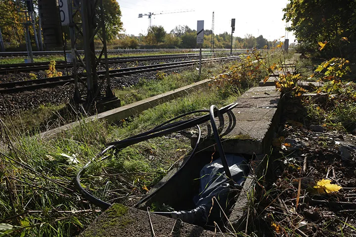 Newly-laid cable lies next to railway tracks at the spot where technicians repaired a section of fibre optic cable the day before that had been severed in an act of sabotage in Berlin, Germany, on Oct. 9.&nbsp;