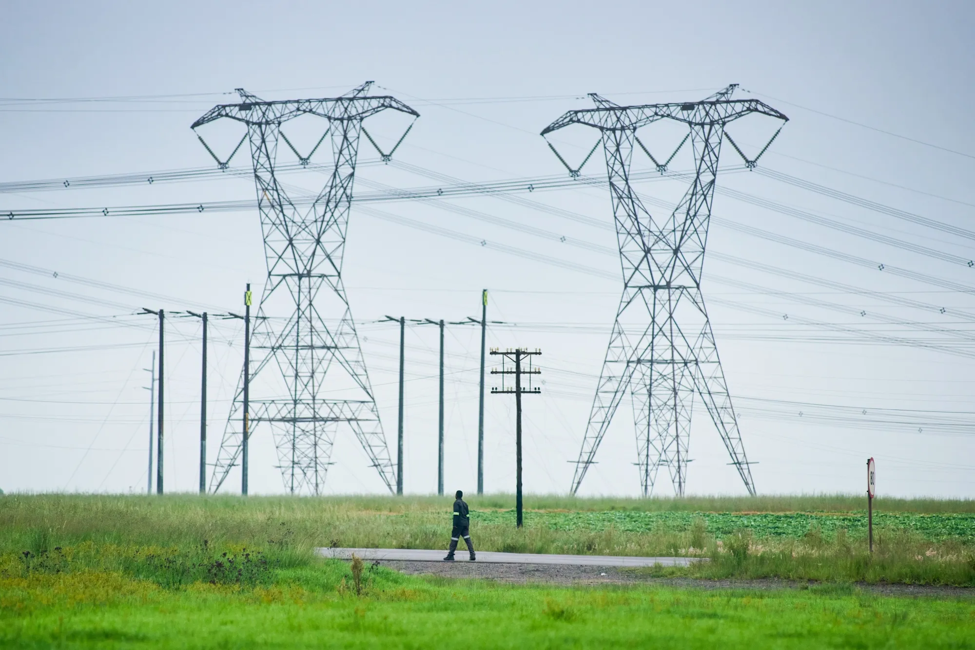 Electricity pylons near the Eskom Holdings SOC Ltd. Kendal coal-fired power plant in Mpumalanga.