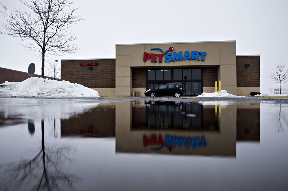 A vehicle drives past a PetSmart Inc. store in LaSalle, Illinois