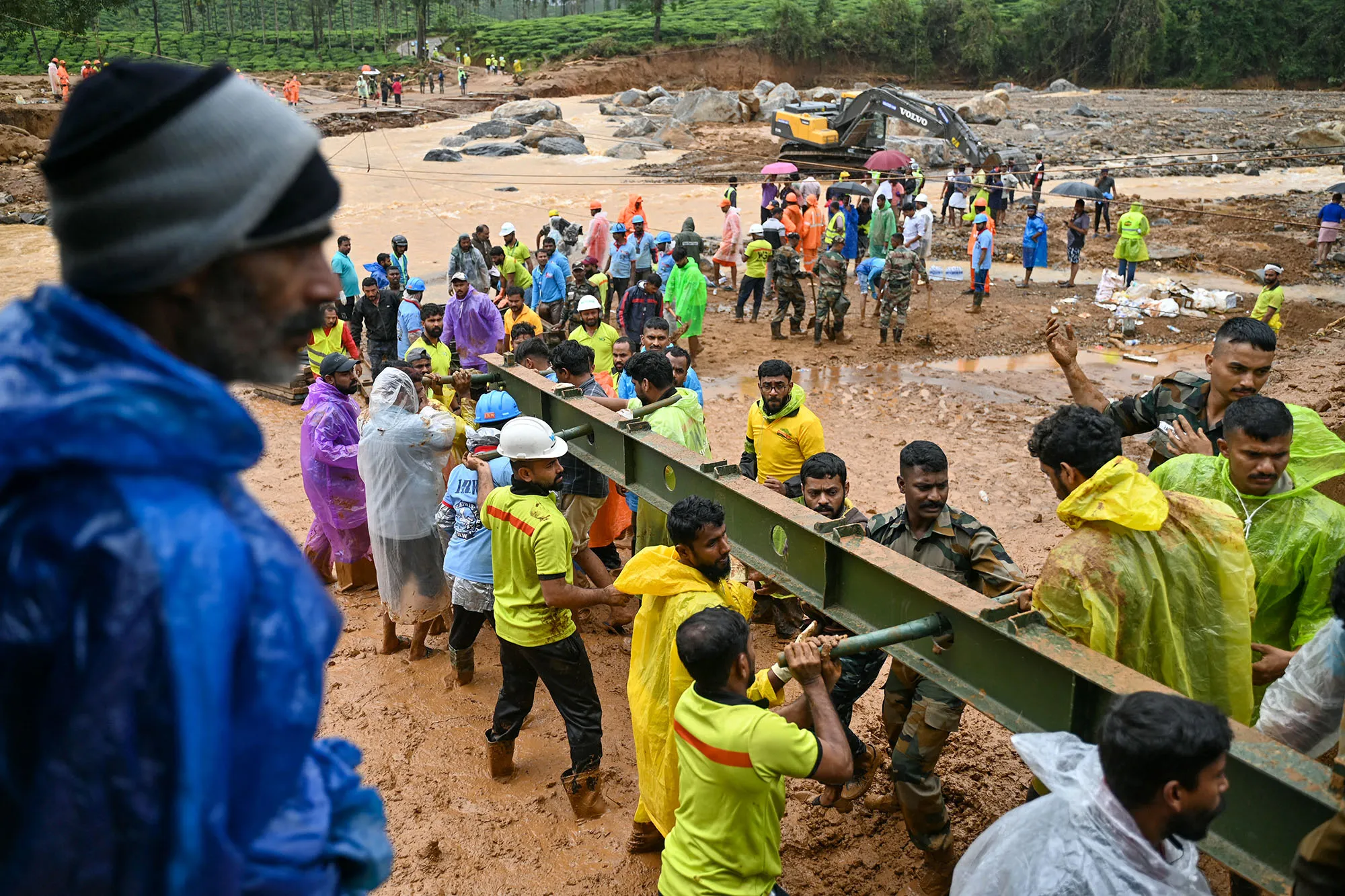 Relief personnel conduct a search and rescue operation after landslides in Wayanad, India&nbsp;on July 31.