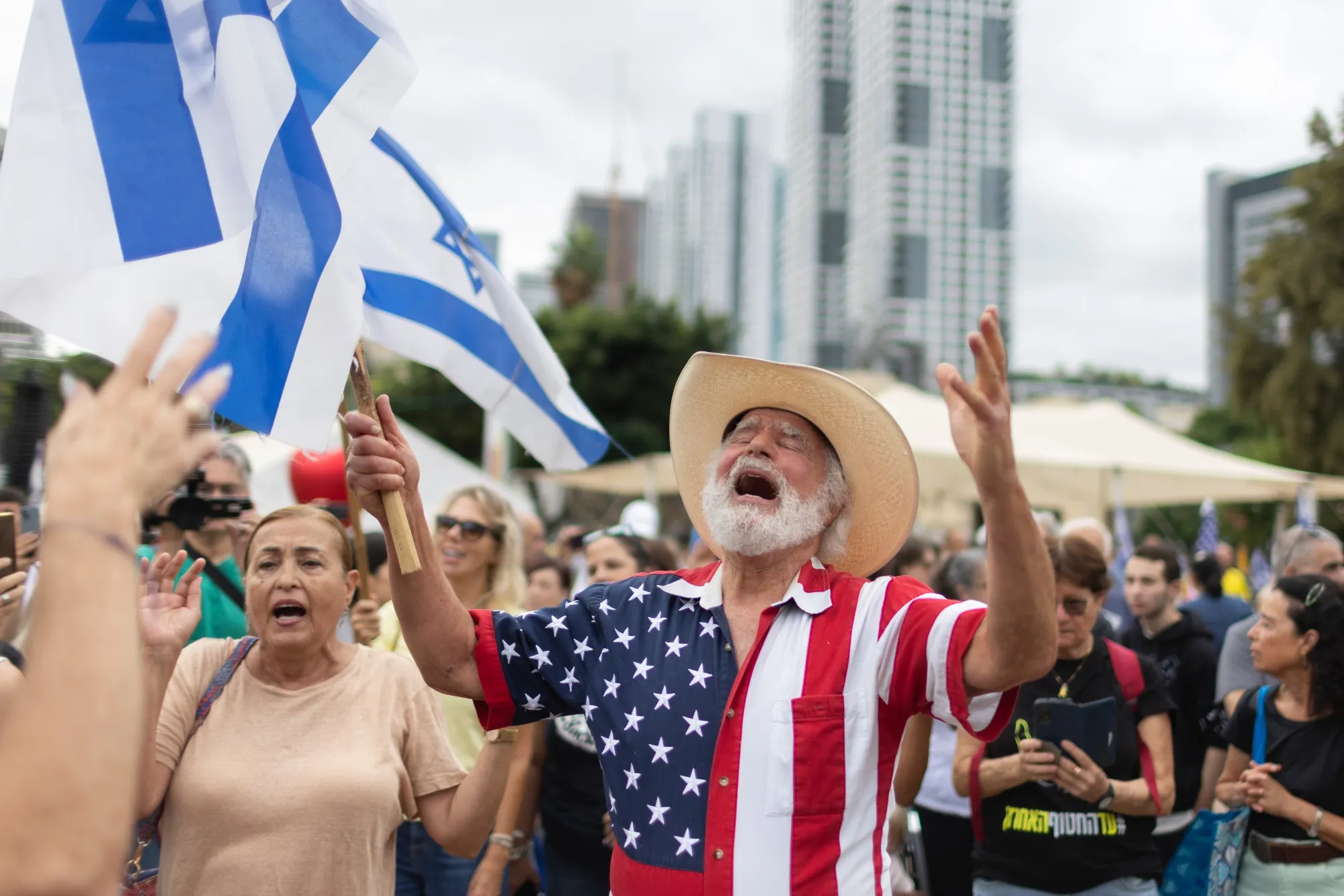 Israelis celebrate the announcement that Israel and Hamas have reached a deal for the release all hostages.
