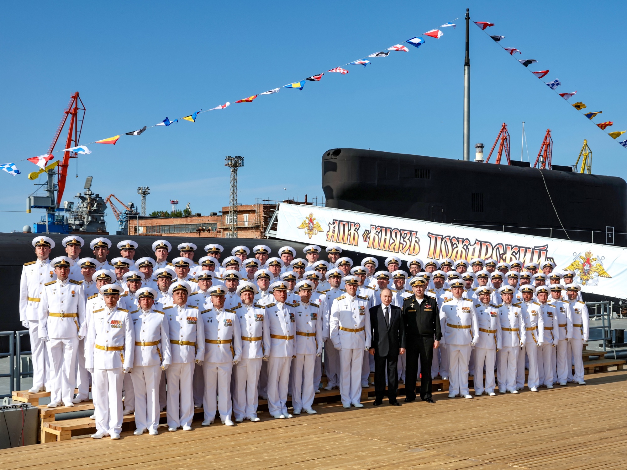 Putin attends a flag-raising ceremony in Severodvinsk in this photo supplied by Russian state media on July 24, 2025. Photographer: Alexander Kazakov/Sputnik/AFP/Getty Images