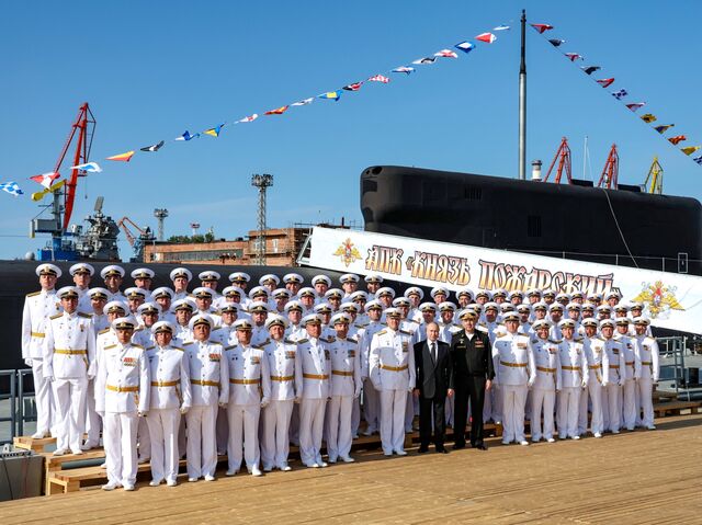 In this photo supplied by Russian state media, Putin attends a flag-raising ceremony for the Knyaz Pozharsky nuclear-powered submarine, in Severodvinsk in July 2025.
