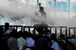 Police use water canons to disperse demonstrating students&nbsp;in Colombo, on May 29.