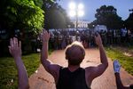 Demonstrators raise their hands in front of the police line at the White House as they protest the death of George Floyd at the hands of Minneapolis Police in Washington, D.C. on May 31, 2020.
