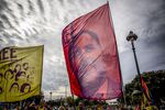 Protesters display a banner featuring&nbsp;Oriol Junqueras during a demonstration in Barcelona on Oct. 18, 2019.