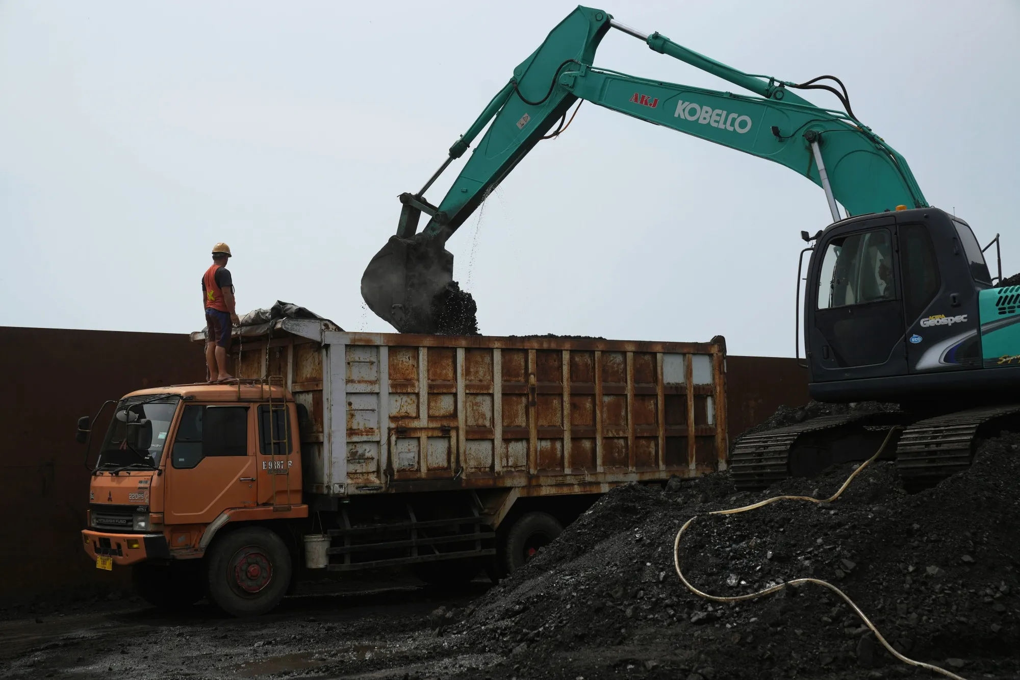 Coal is loaded onto a dump truck at Cirebon Port in West Java.