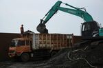 Coal is loaded onto a dump truck at Cirebon Port in West Java.