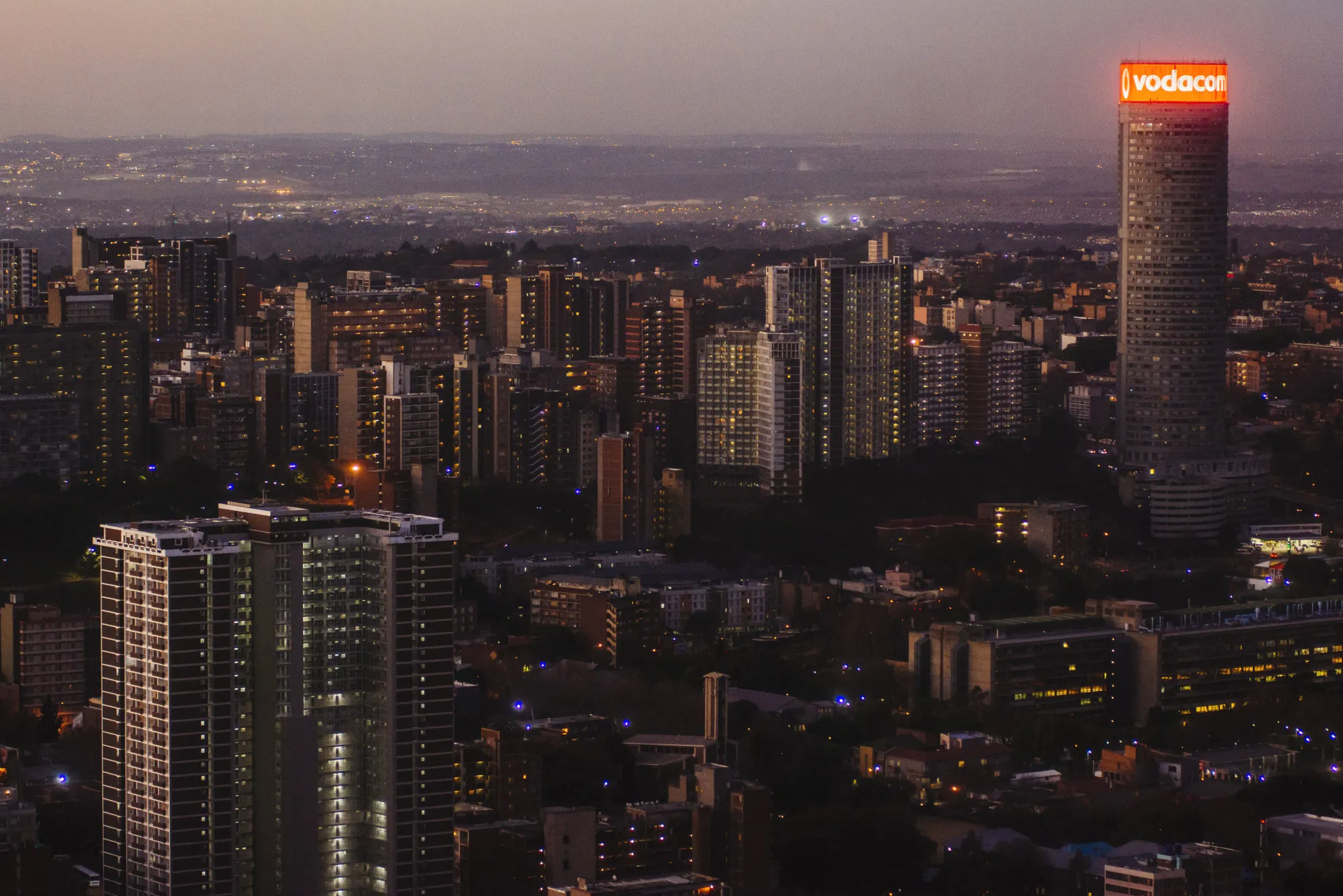 A Vodacom Group Ltd. advertisement surrounds the top of the Ponte tower&nbsp;in Johannesburg, South Africa, in 2018.&nbsp;