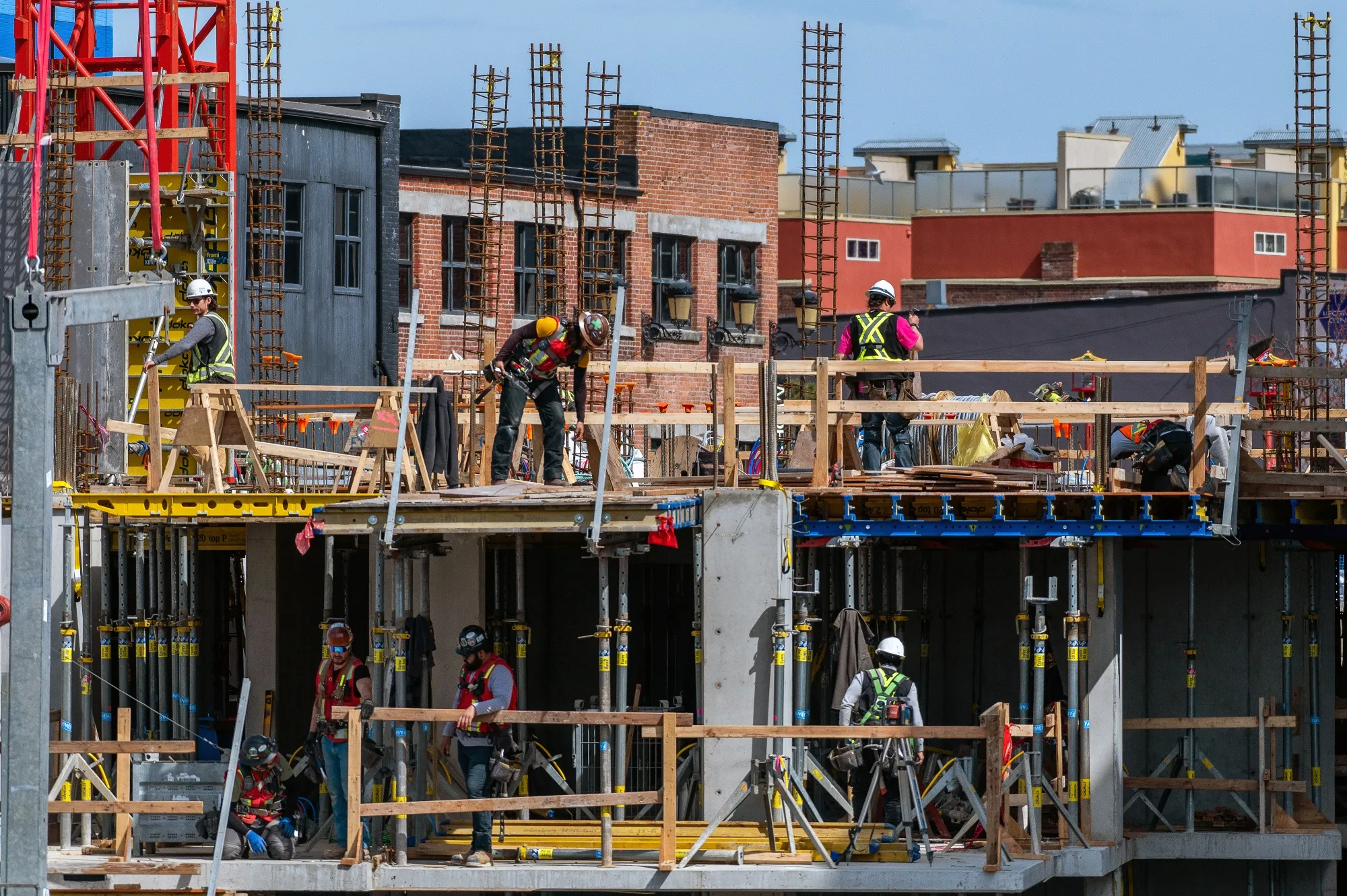 Workers on a condo building under construction in Victoria, British Columbia, Canada, on April 7.&nbsp;