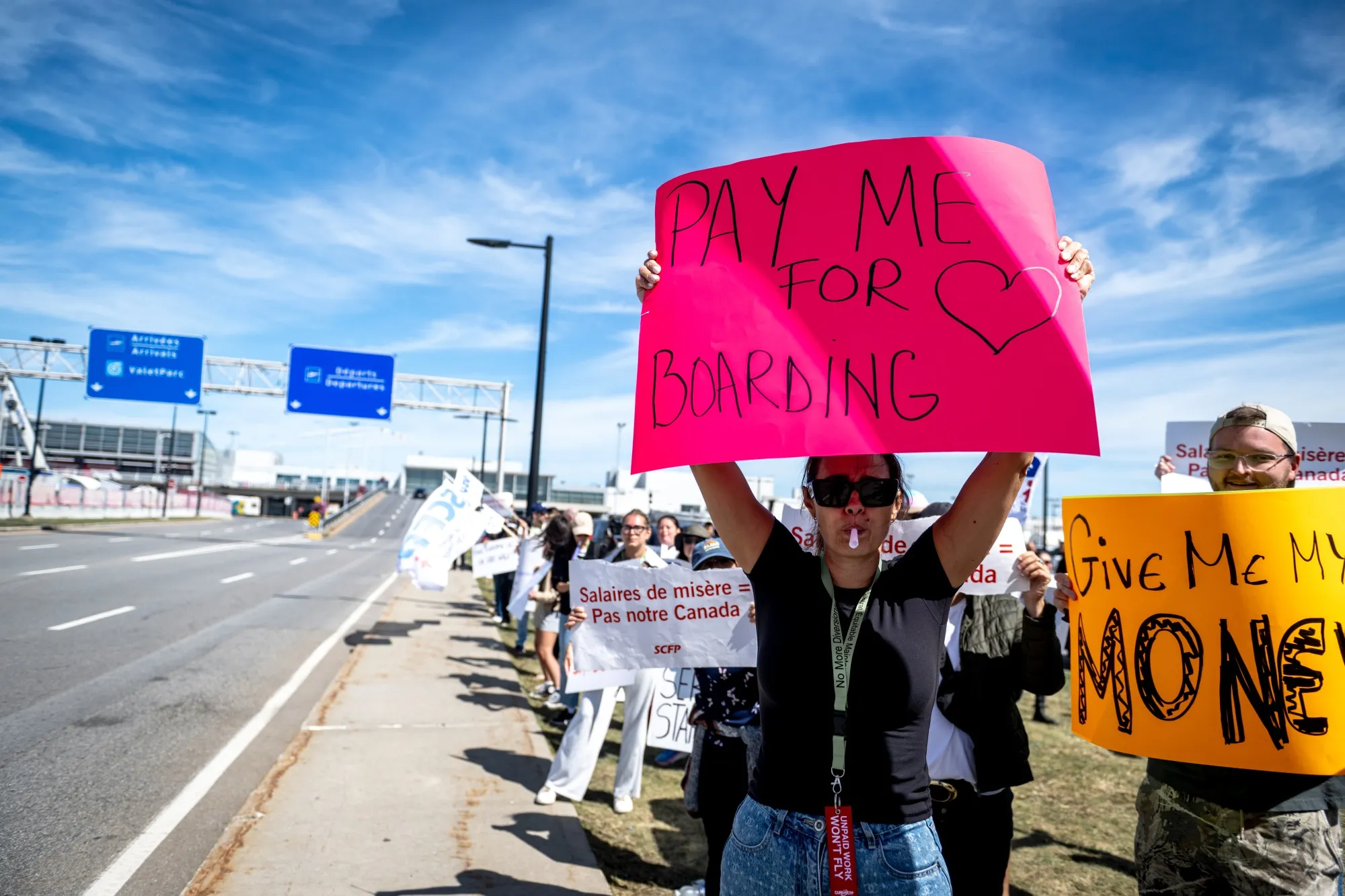 Air Canada flight attendants during a strike at Montreal-Pierre Elliott Trudeau International Airport on Aug. 18.