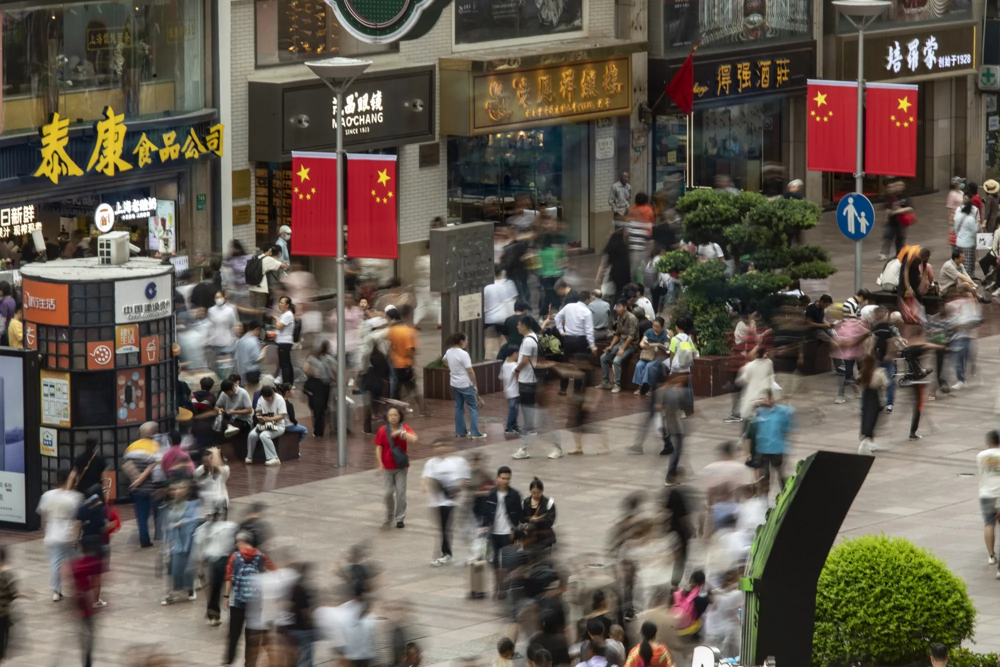 Pedestrians and shoppers on Nanjing Road in Shanghai during Golden Week earlier this month.