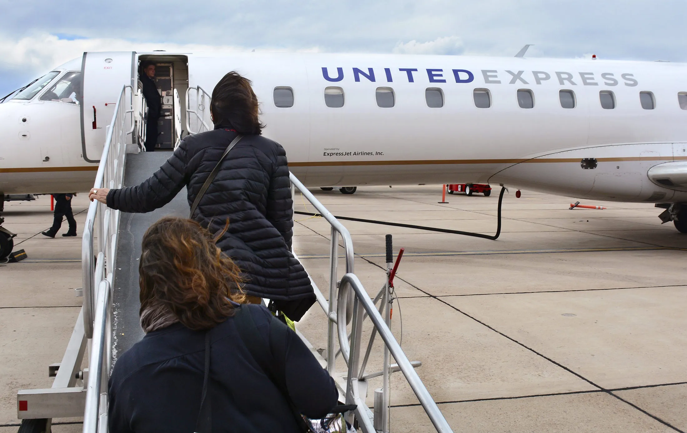 Passengers board a United Express passenger aircraft at Santa Fe Municipal Airport in New Mexico in 2015.