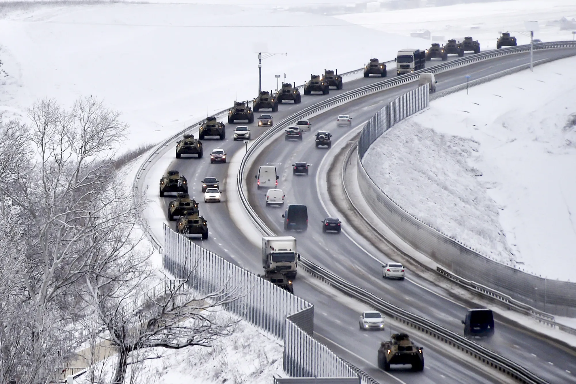 A convoy of Russian armored vehicles moves along a highway in Crimea on Jan. 18.&nbsp;