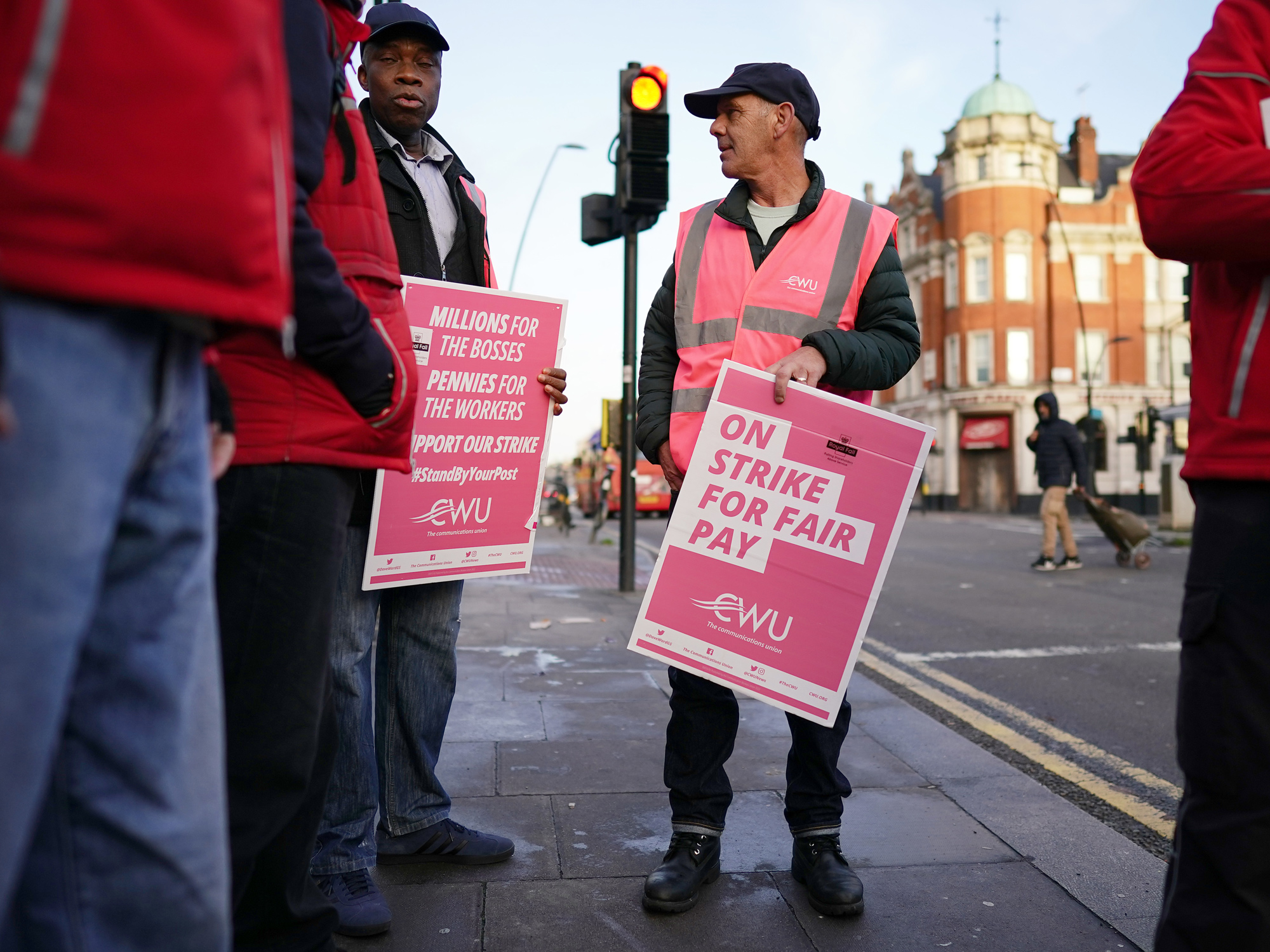 Postal workers on a picket line at Kilburn Delivery Office in London on Nov. 24.