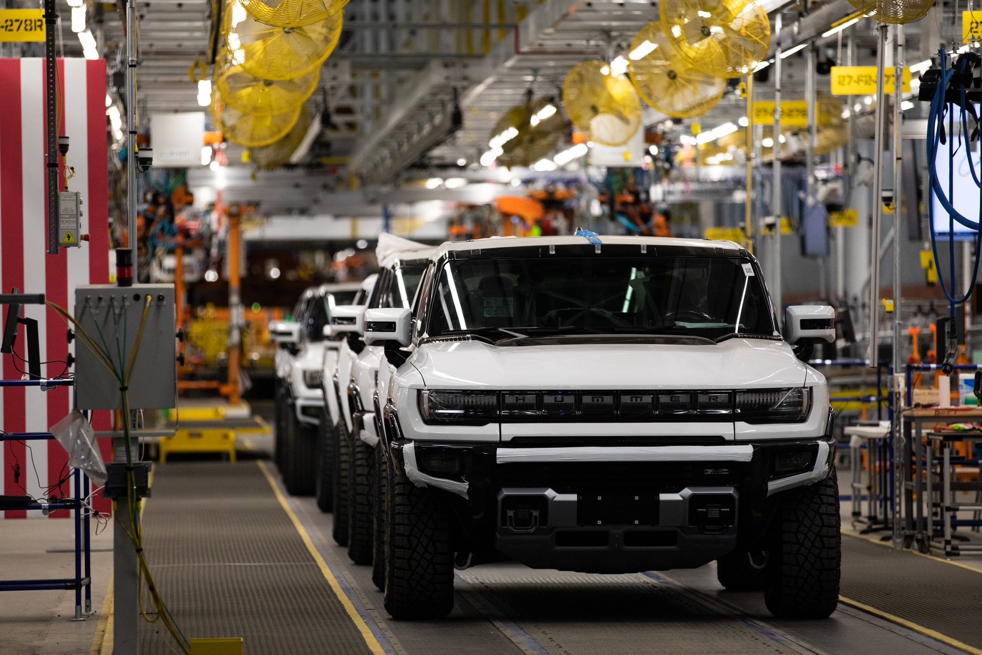 GMC Hummer electric vehicles on the production line at General Motors' Factory ZERO all-electric vehicle assembly plant in Detroit, Michigan.