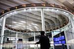 An electronic ticker displays share prices at the Tokyo Stock Exchange.