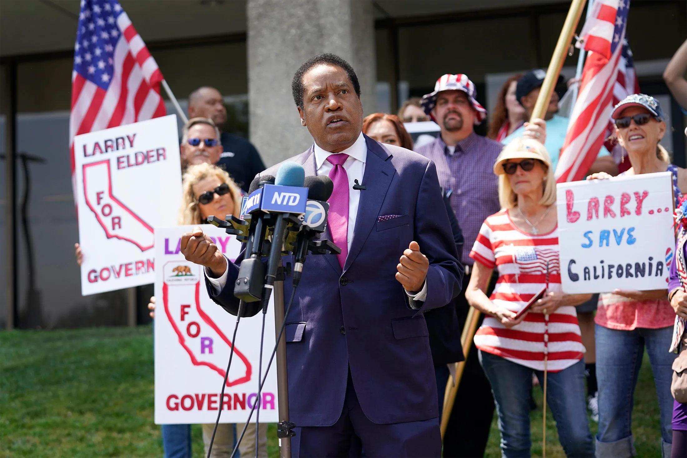 Larry Elder speaks to supporters during a campaign stop in Norwalk, Calif., on July 13.