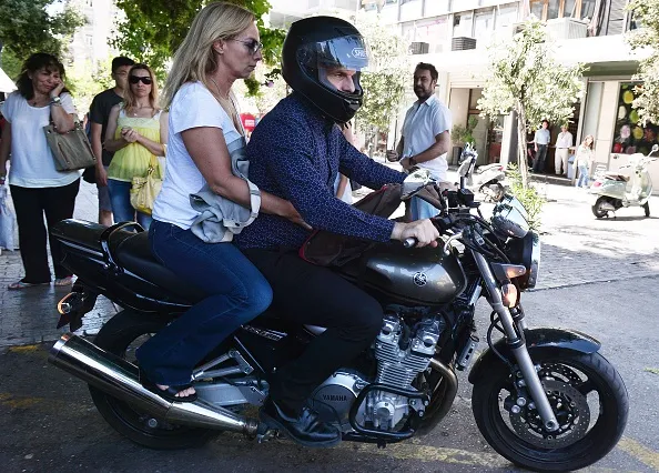 Finance Minister Varoufakis rides off.
