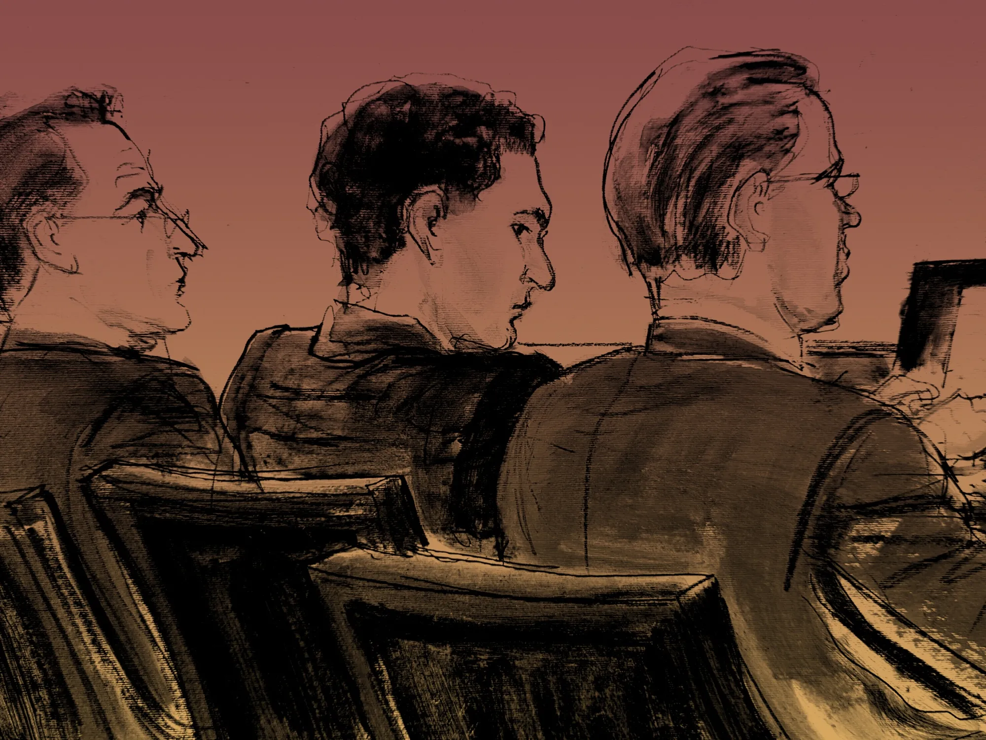 Sam Bankman-Fried, center, flanked by defense attorneys as jury selection begins in his fraud trial&nbsp;on Oct. 3.